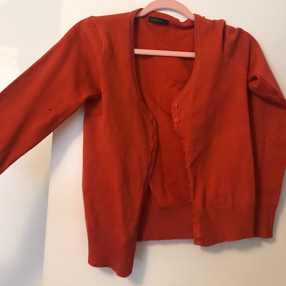 Cardigan. Never worn.
